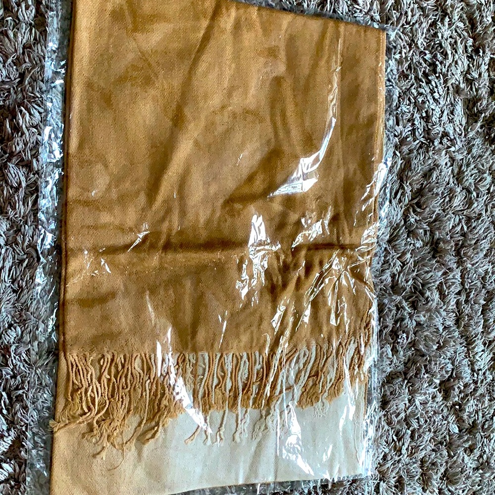 Brand new  scarf. Great for gifts. Ombre color tan
